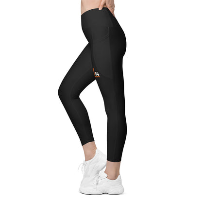 Monogram Women’s Pocket Leggings: Black: left leg monogram
