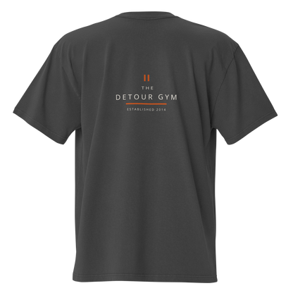 Coach Boxy Tee in Faded Black, AS Colour 5082, back view. Genuine Printful garment mockup.