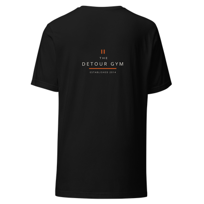 Coach Regular Tee in Black, Bella + Canvas 3001, back view. Genuine Printful garment mockup.