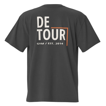 Cutline Oversized Tee in Faded Black, AS Colour 5082, back view. Genuine Printful garment mockup.