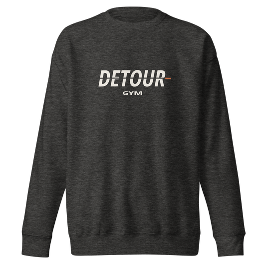 Offset Crewneck in Charcoal Heather, with raised Detour chest graphic. Genuine Printful mockup.